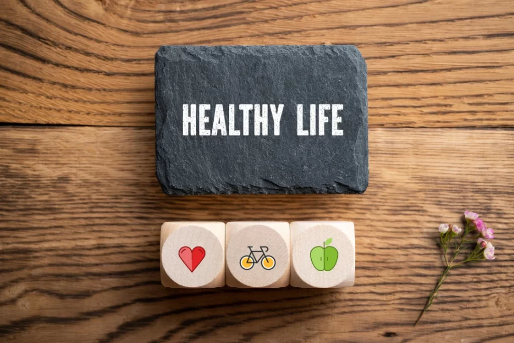 Health Life is written on a black slate with white-chalk.